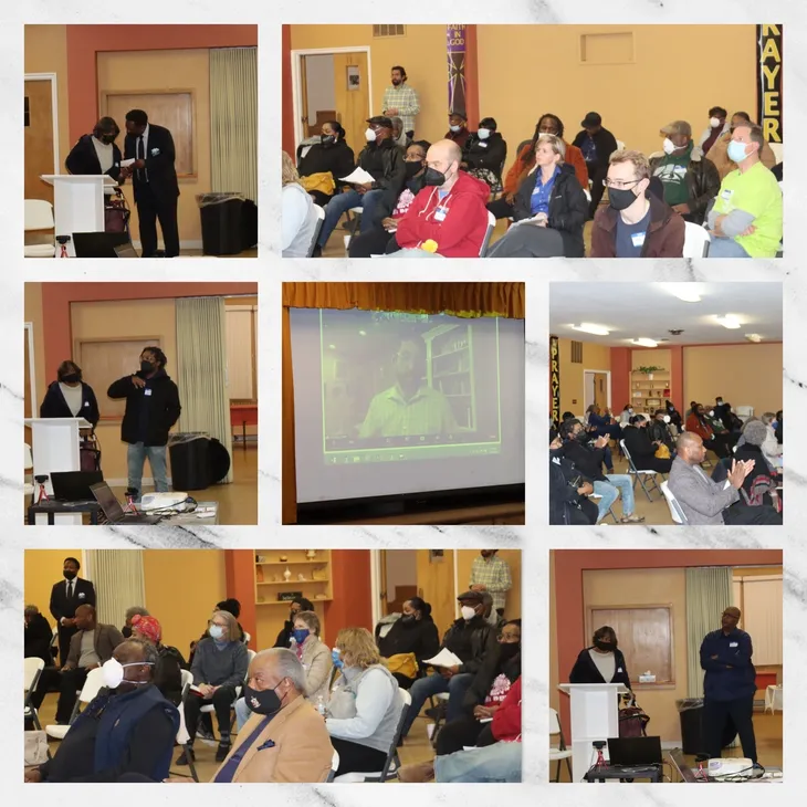 Community meeting with attendees and presentations.